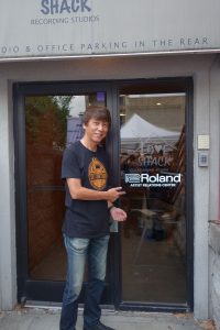 Yoshi Ikegami, President, BOSS Corporation, at the entrance to the Roland Nashville Artist Relations Center.
